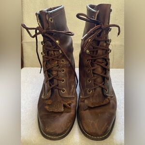 Distressed brown leather lace-up cowboy boots, size 7.